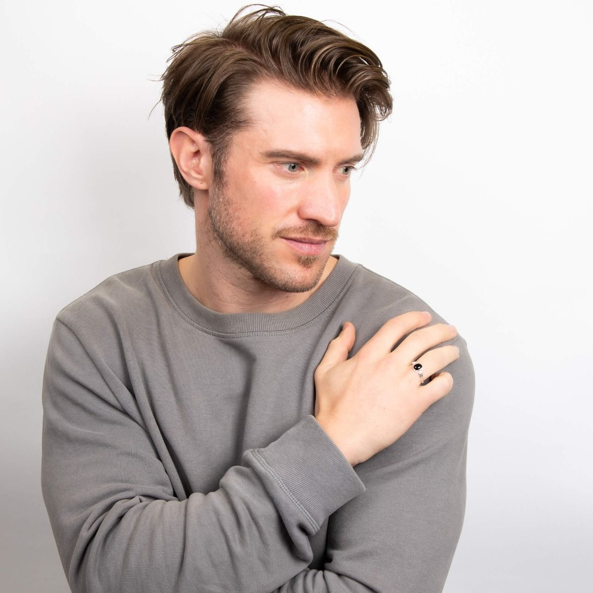 Model wears Sterling Silver Celtic Onyx Signet Ring