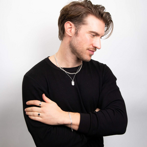 Model wears Sterling Silver Celtic Onyx Signet Ring