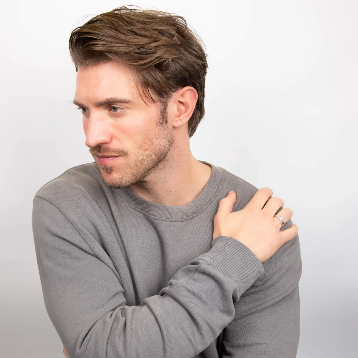 Model wears Sterling Silver Plaited Design Band Ring