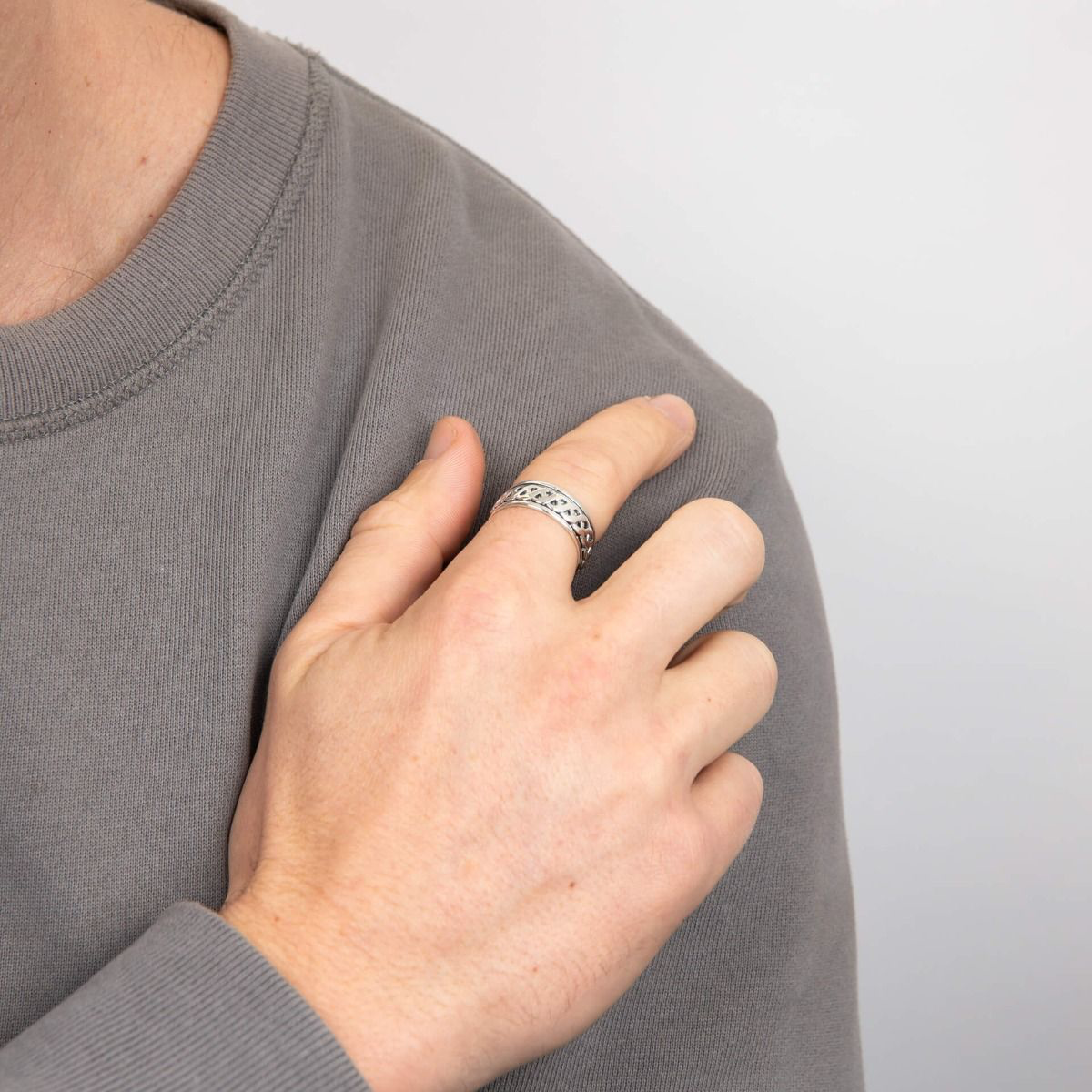 Model wears Sterling Silver Celtic Design Spinner Ring
