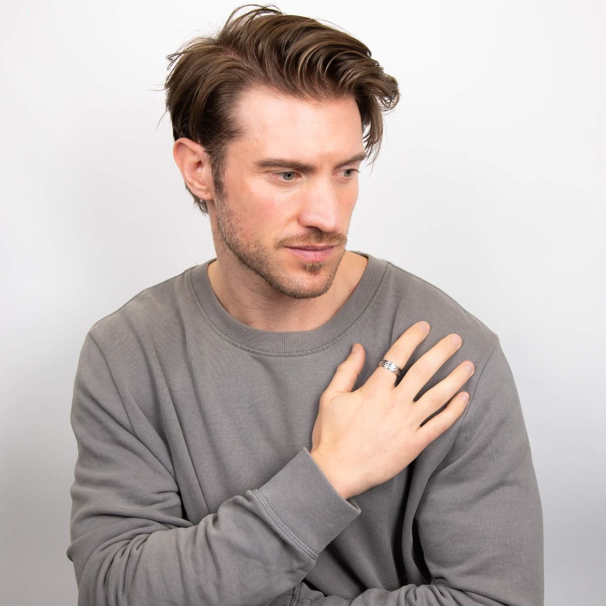 Model wears Sterling Silver Celtic Design Spinner Ring