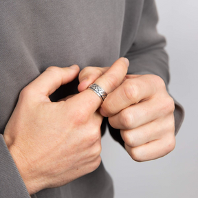 Model wears Sterling Silver Celtic Design Spinner Ring