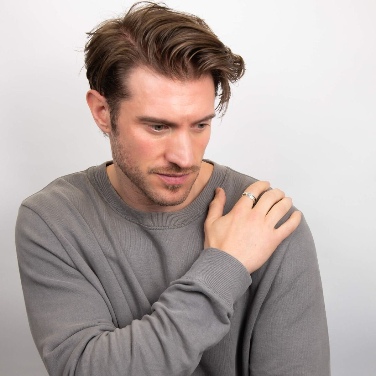 Model wears Sterling Silver Motion Celtic Ring