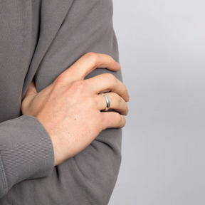 Model wears Oxidised Sterling Silver Inset Pattern Ring