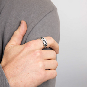 Model wears Oxidised Sterling Silver Heavyweight Plaited Ring
