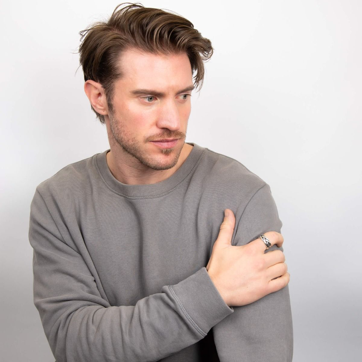 Model wears Oxidised Sterling Silver Heavyweight Plaited Ring