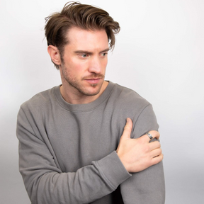 Model wears Oxidised Sterling Silver Heavyweight Plaited Ring