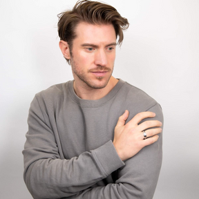 Model wears Sterling Silver Twist Design Spinner Ring