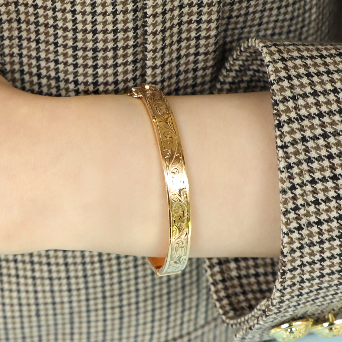 Model wears 9ct Yellow Gold Hollow Engraved Hinged Bangle