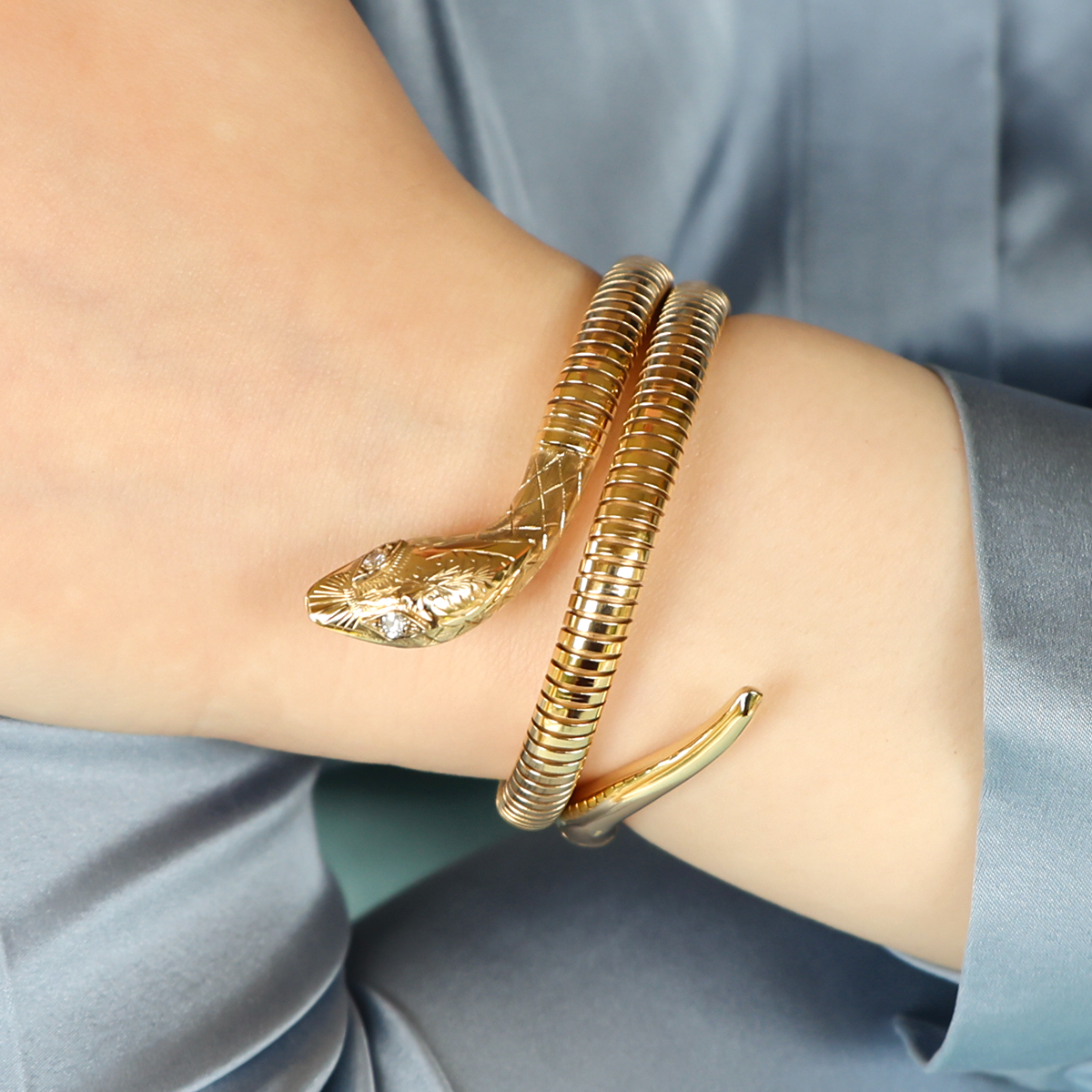 Model wears 9ct Yellow Gold Diamond Set Double Coiled Snake Bracelet