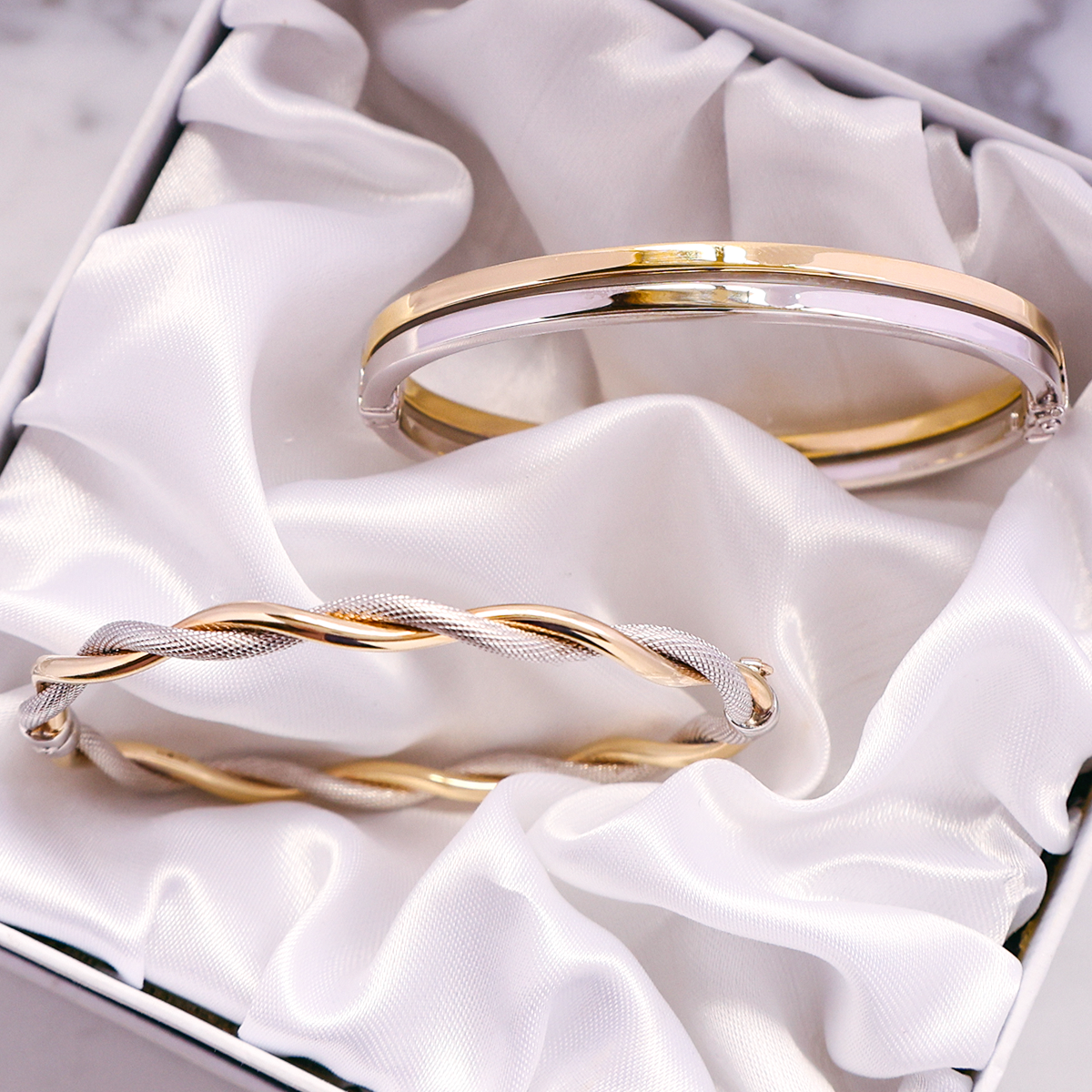 9ct Two Colour Gold Double Band Tension Bangle & 9ct Two Colour Gold Plain & Patterned Double Twist Tension Bangle