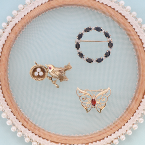 9ct Yellow Gold Bird Nest Set with Ruby & Pearls Brooch, 9ct Yellow Gold Sapphire & Diamond Set Circle Brooch & 9ct Yellow Gold Garnet Set Butterfly Brooch