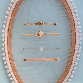 9ct Yellow Gold Sapphire Love Knot Brooch, 9ct Yellow Gold Oval Shaped Cameo Bar Brooch, 9ct Yellow & White Gold Opal Solitaire Bar Brooch & 9ct Rose Gold Plain Polished Bar Brooch
