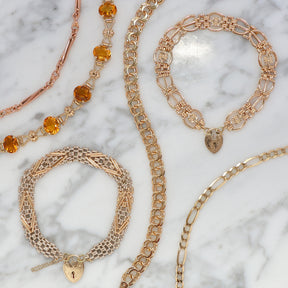 A selection of 9ct and 14ct gold bracelets.