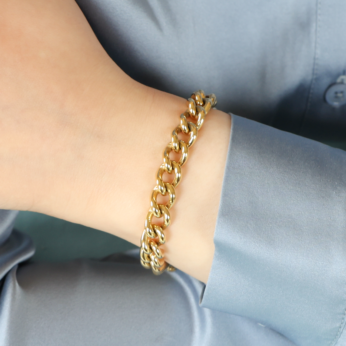 Model wears 9ct Yellow Gold Heavy Curb Link Charm Bracelet