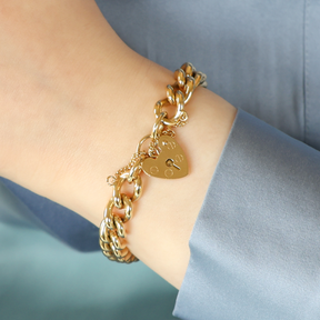 Model wears 9ct Yellow Gold Heavy Curb Link Charm Bracelet