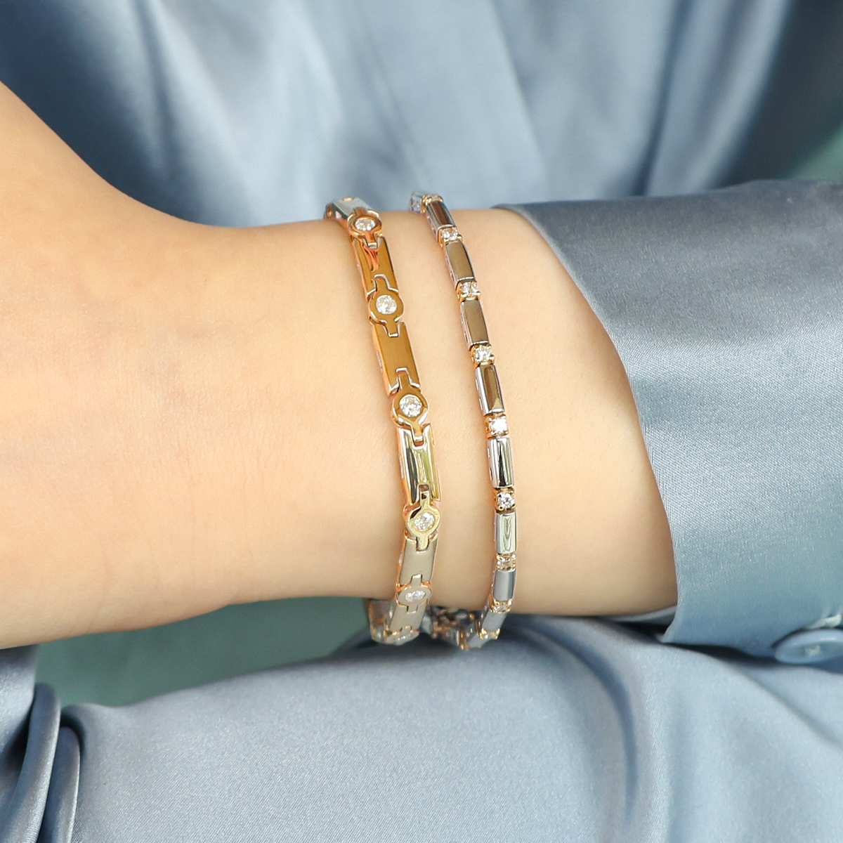 Model wears 9ct Yellow Gold Diamond Bezel Set Round Link & Bar Bracelet & 9ct Yellow & White Gold Diamond Claw Set Bar Bracelet