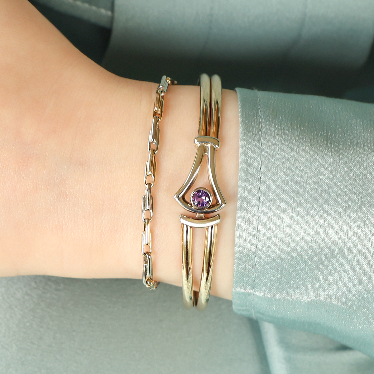 Model wears 9ct Yellow & White Gold Interlocking Log Link Bracelet & 9ct Yellow & White Gold Amethyst Solitaire Tension Bangle