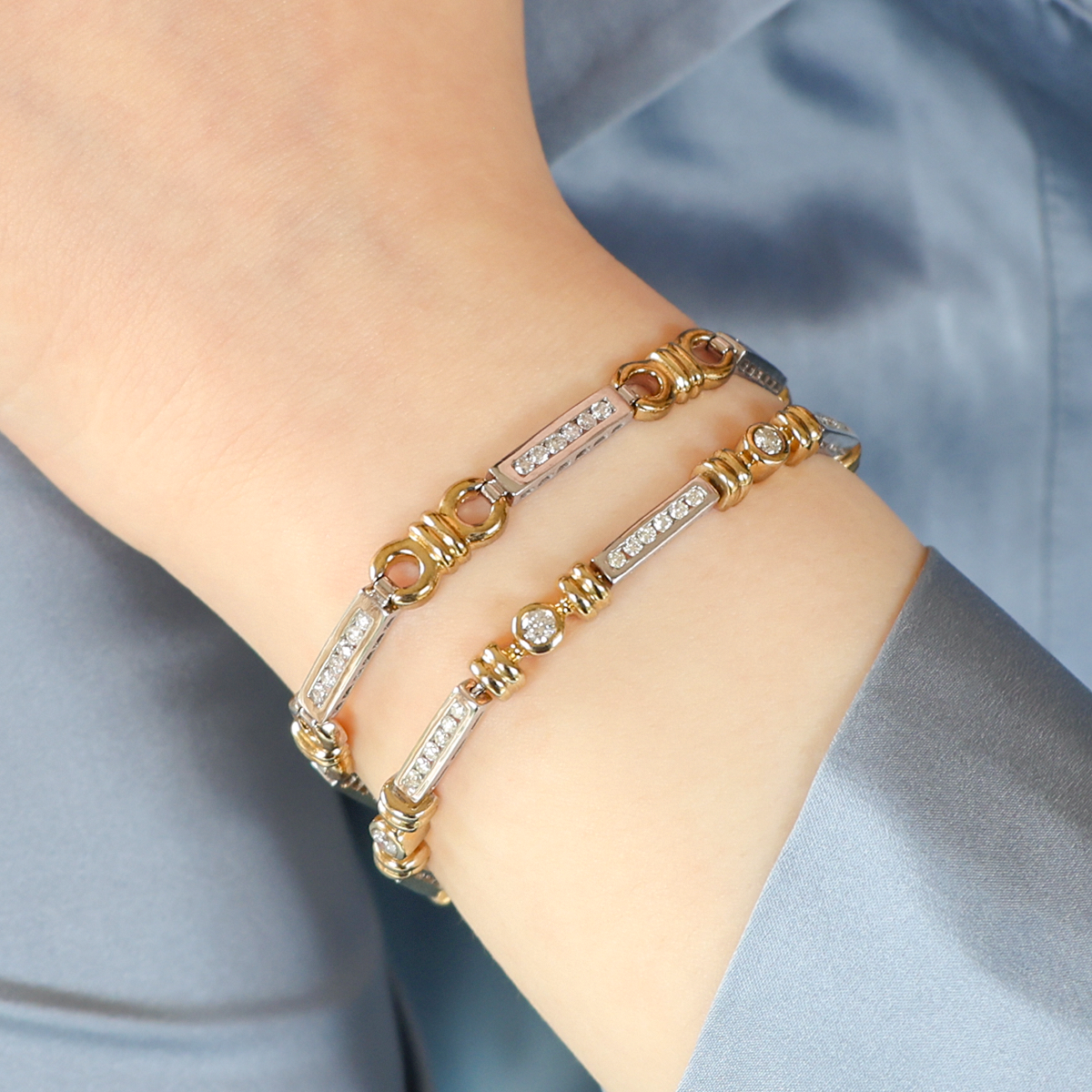 Model wears 9ct Yellow & White Gold Diamond Channel Set Bar & Circle Link Bracelet & 9ct Yellow & White Gold Diamond Channel & Bezel Set Link Bracelet