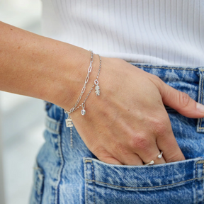 Model wears 9ct White Gold Tanzanite Bezel Set Charm