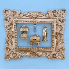9ct Yellow Gold Wishing Well Charm, 9ct Yellow Gold Oval Shaped Rock Crystal Quartz Pendant, 9ct Yellow Gold Large Gypsy Fortune Teller Wagon Opening Charm, 9ct Yellow Gold Hollow Penguin Pendant By Georg Jensen