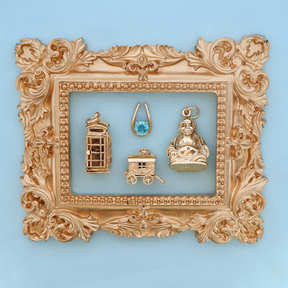 9ct Yellow Gold Large Telephone Box Opening Charm, 9ct Yellow Gold Apatite Horseshoe Pendant, 9ct Yellow Gold Gypsy Fortune Teller Wagon with Enamel Opening Charm & 9ct Yellow Gold Buddha Opening Charm