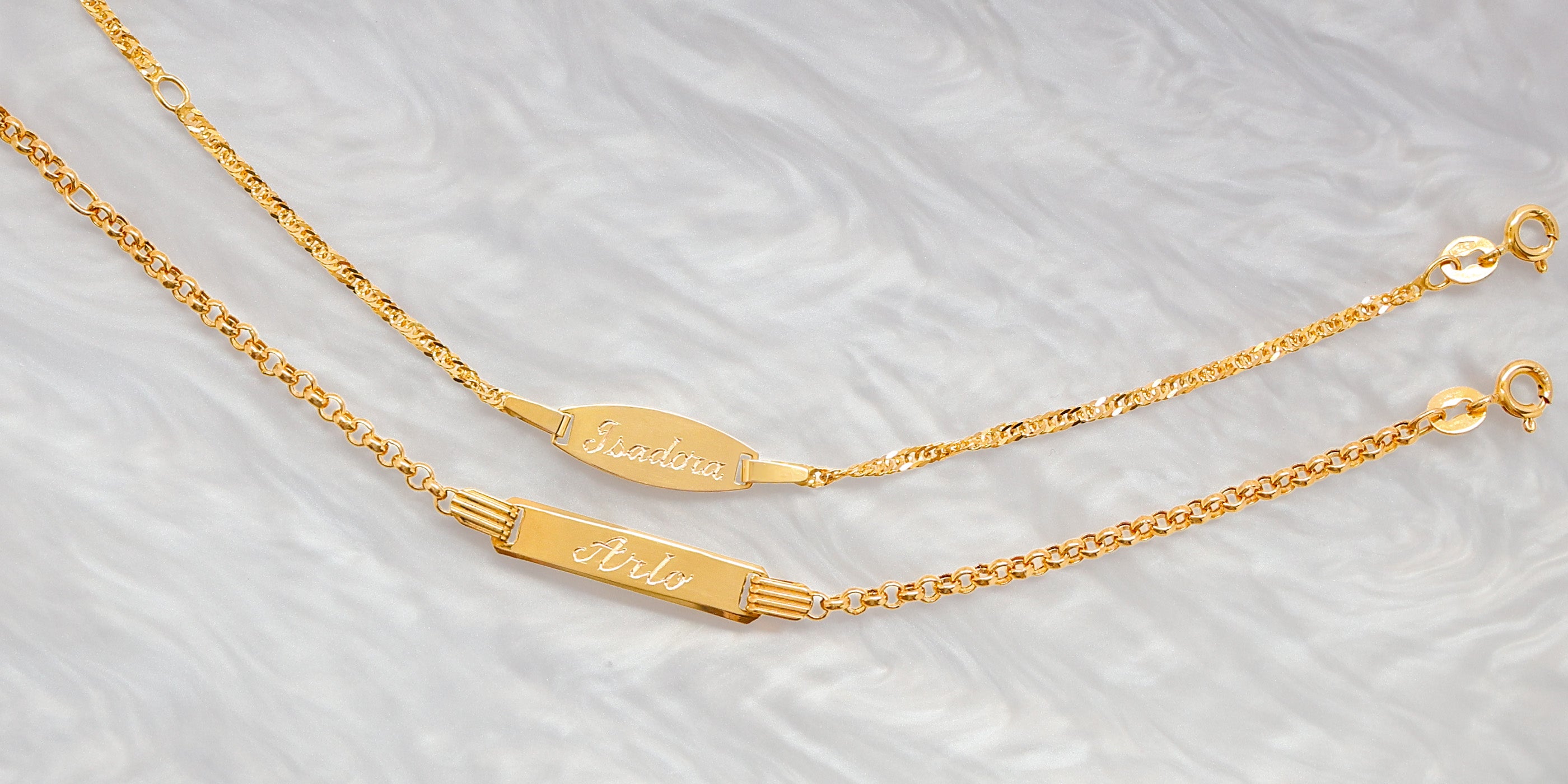 9ct yellow gold children's I.D bracelets personalised with hand-engraved names.     