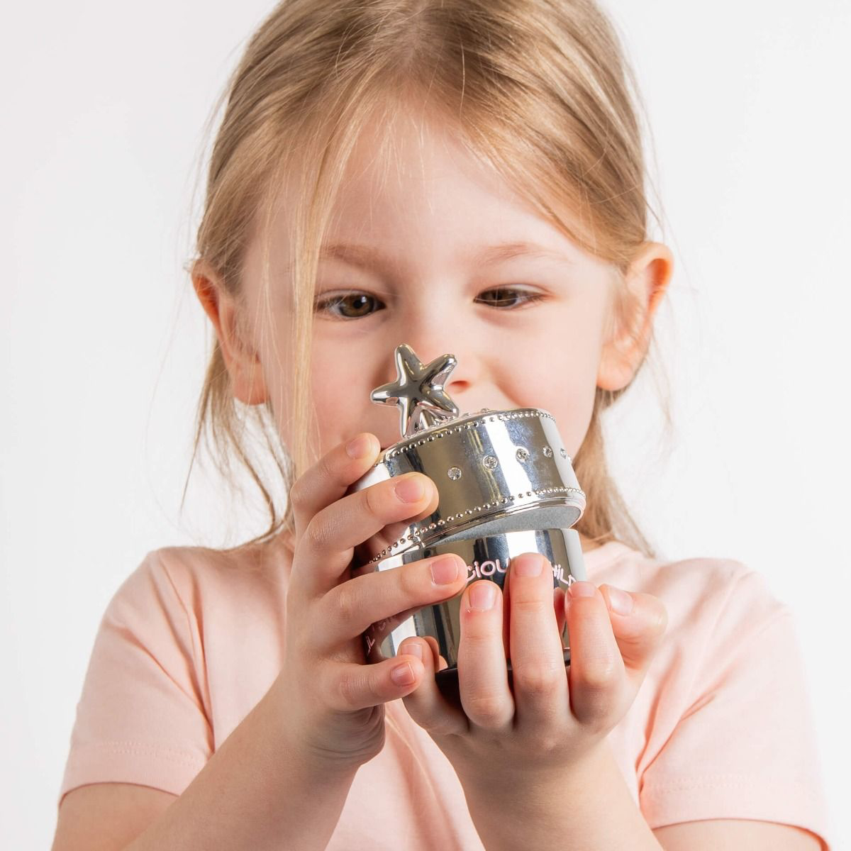 Model holds Silver Plated Pink Star Music Trinket Box with Crystal