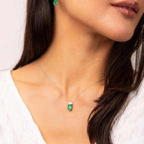 Model wears Sterling Silver Emerald Cut Green Cubic Zirconia Drop Pendant & Chain