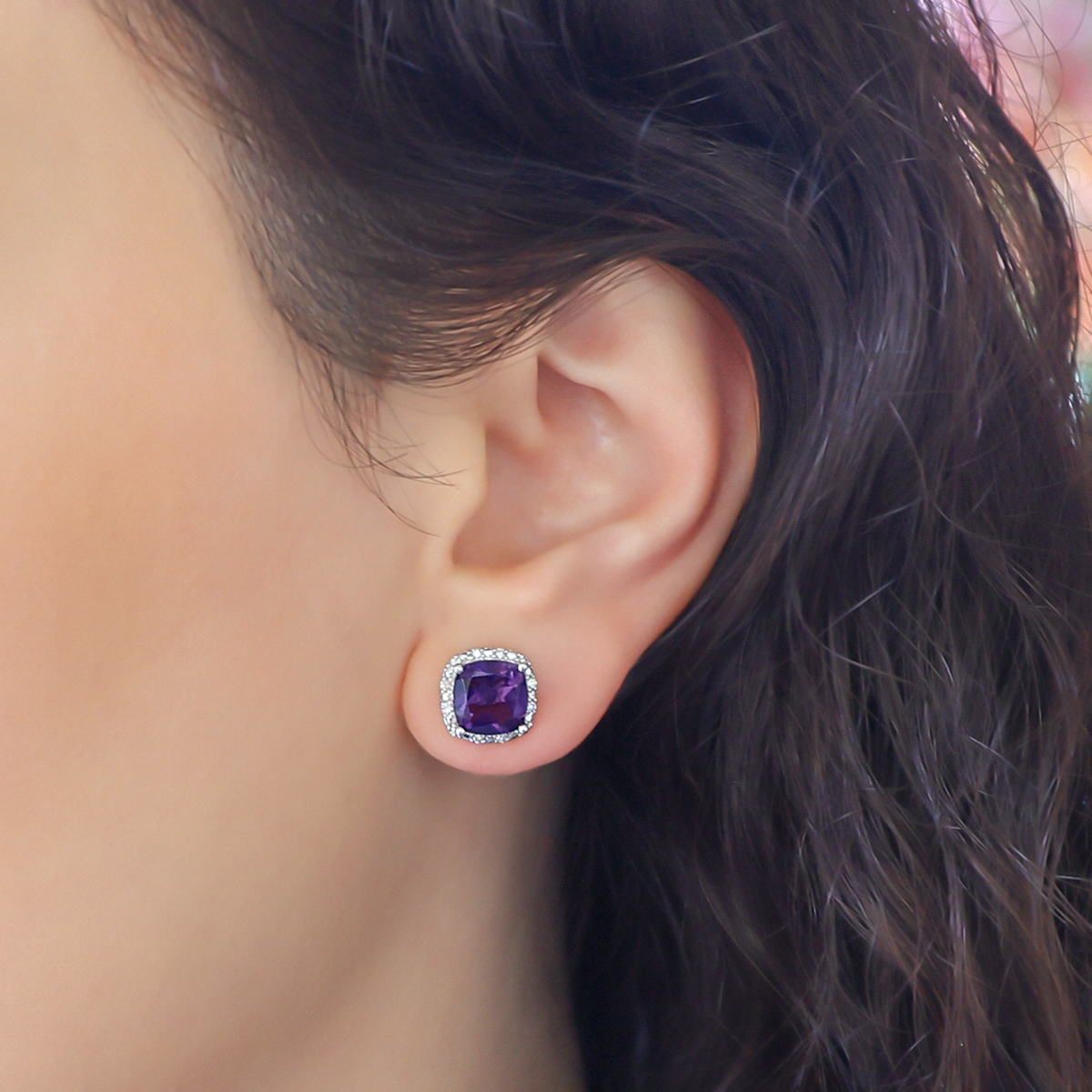 Model wears 9ct White Gold Amethyst & Diamond Halo Stud Earrings