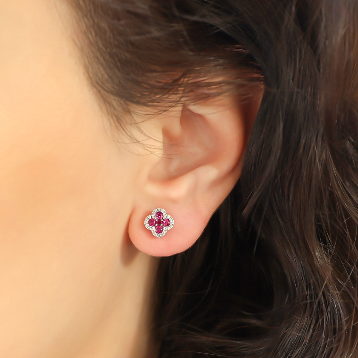 Model wears 9ct White Gold Ruby & Diamond Quatrefoil Stud Earrings