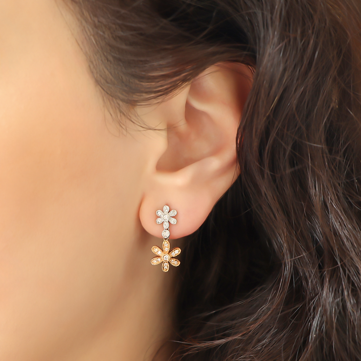 Model wears 18ct Rose & White Gold Diamond Set Flower Drop Earrings