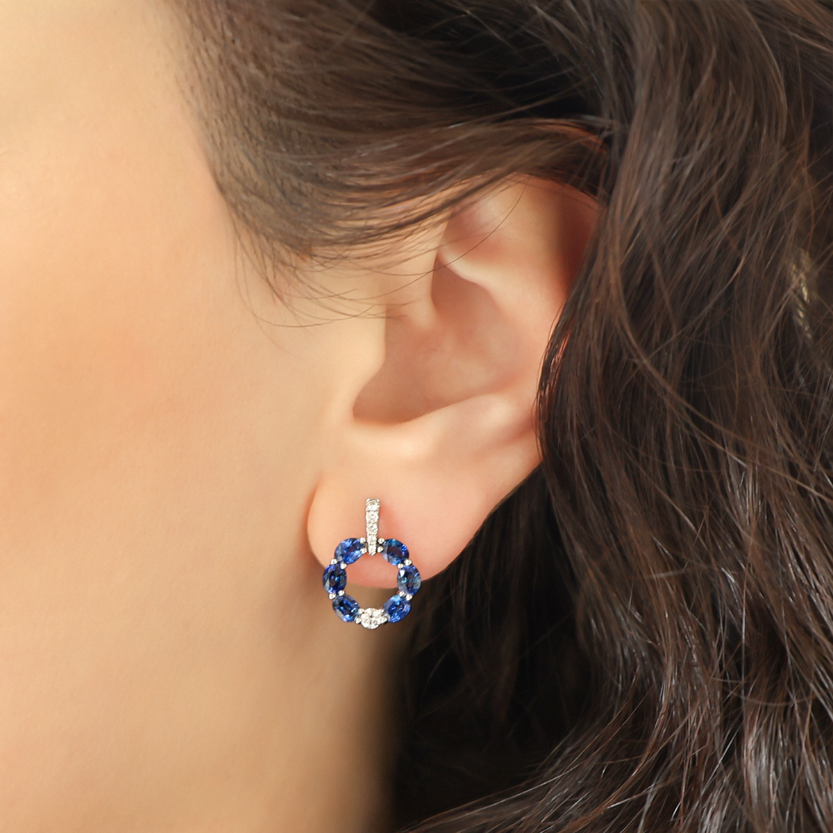 Model wears 18ct White Gold Sapphire & Diamond Circle Drop Earrings