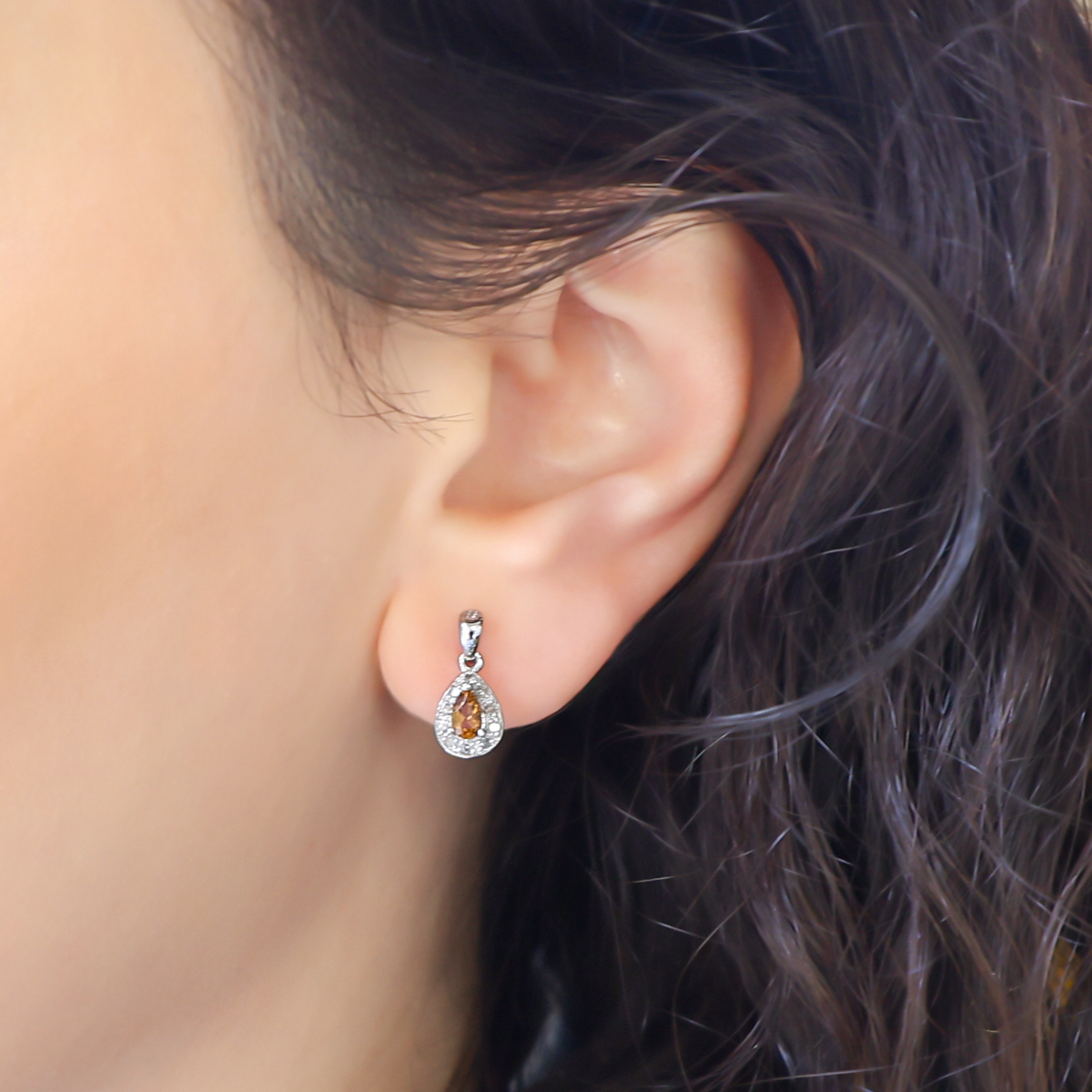 Model wears 9ct White Gold Citrine & Diamond Halo Drop Earrings