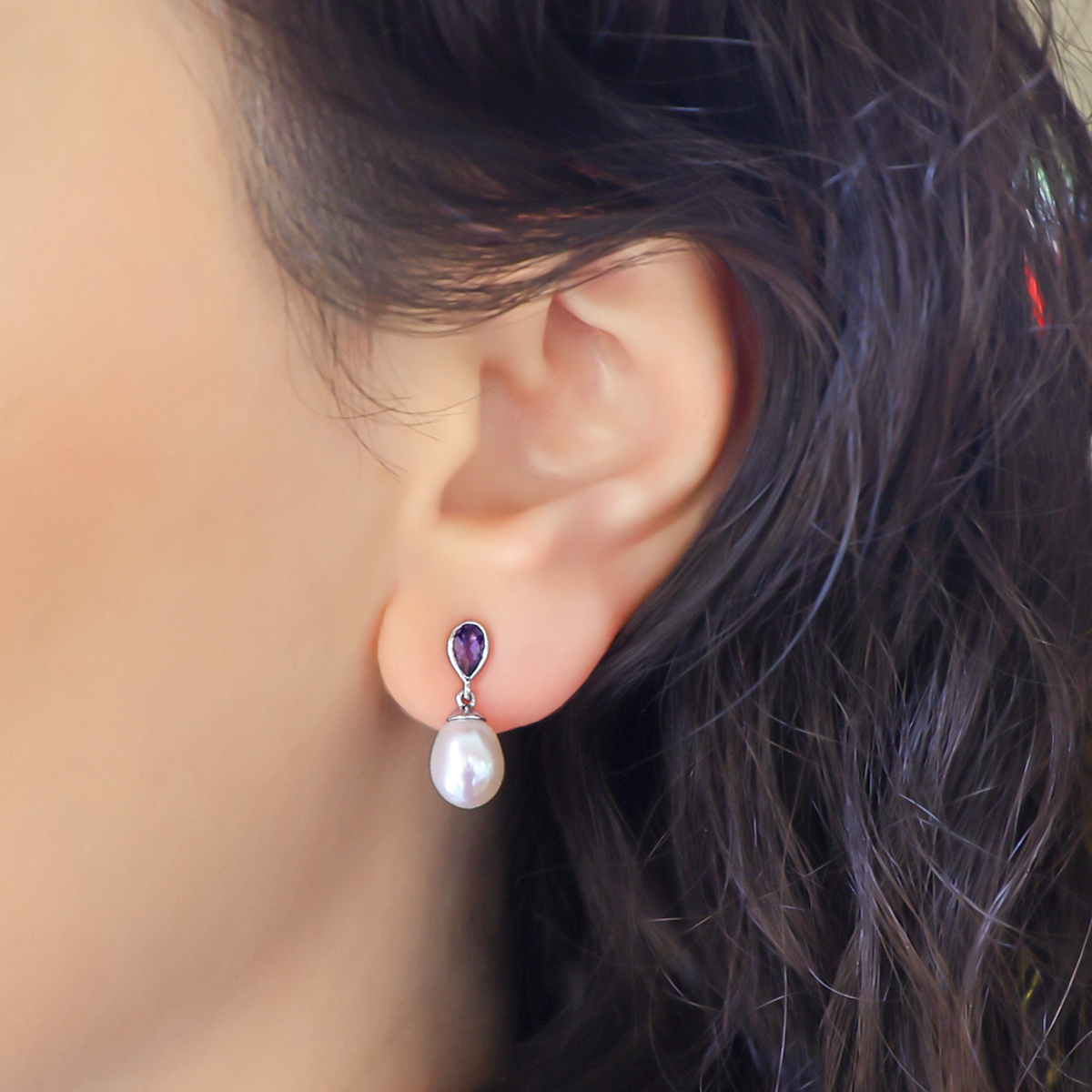 Model wears 9ct White Gold Pearl & Amethyst Drop Earrings