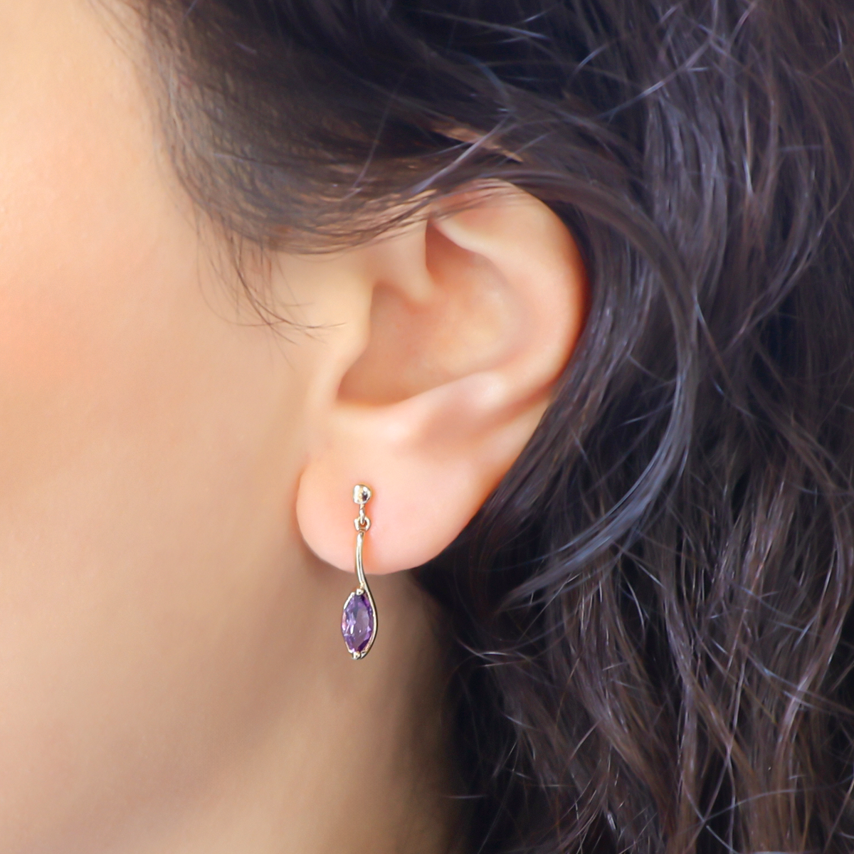 Model wears 9ct Yellow Gold Marquise Shaped Amethyst Drop Earrings