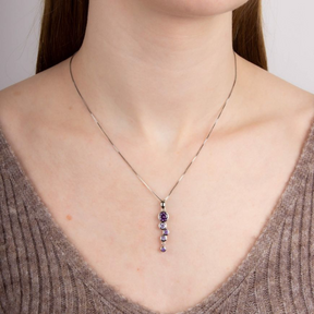 Model wears Sterling Silver Purple Cubic Zirconia Bubble Drop Pendant & Chain