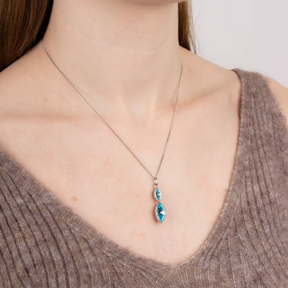 Model wears Sterling Silver Aqua Crystal Navette Twist Drop Pendant & Chain