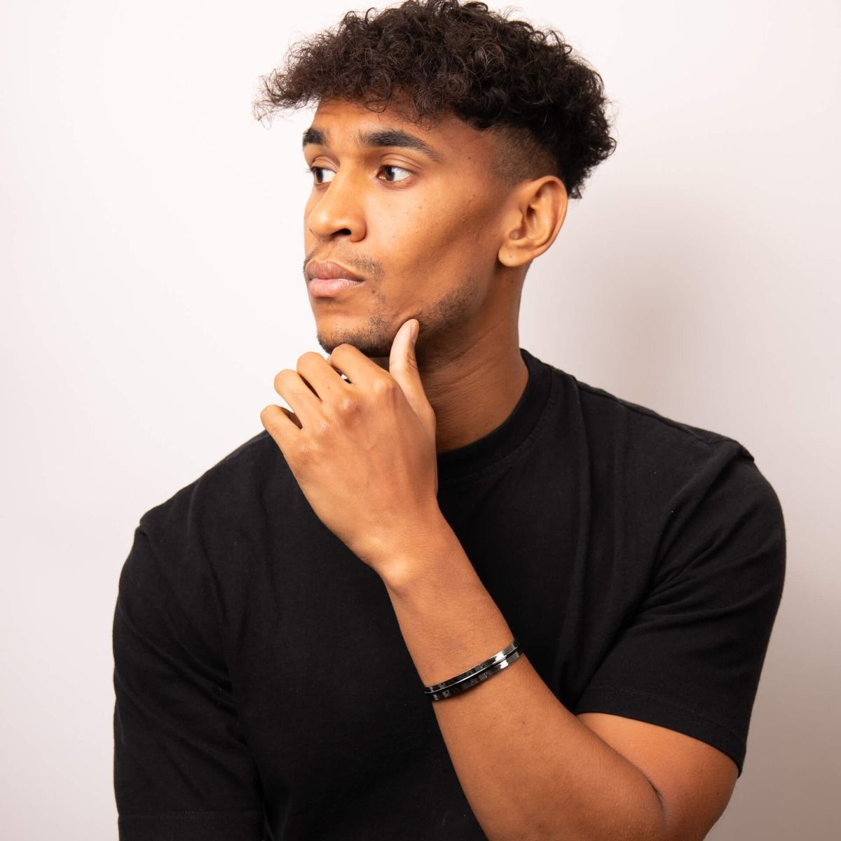 Model wears Stainless Steel Black PVD Stripe Cuff Bangle