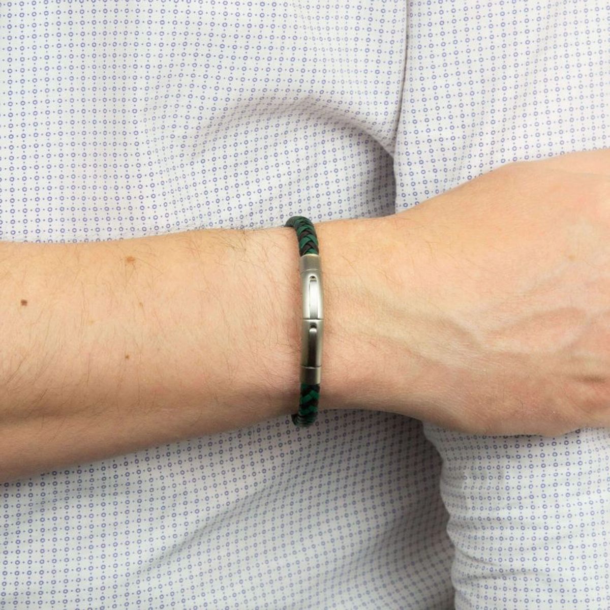 Model wears Black & Forest Green Plaited Recycled Leather Bracelet With Stainless Steel Clasp