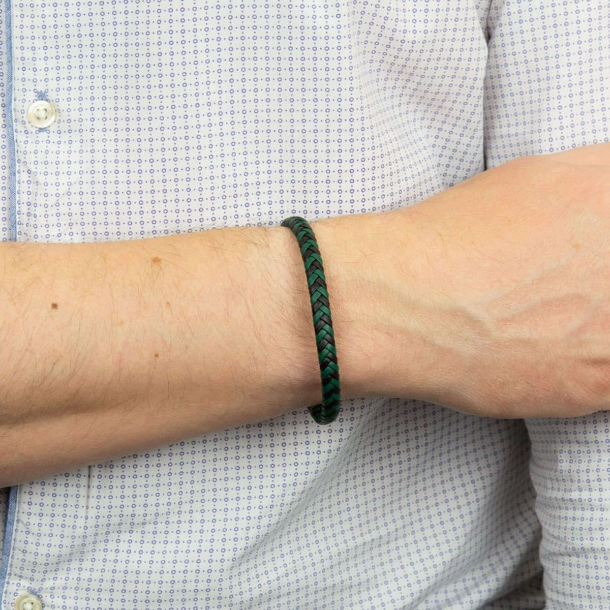 Model wears Black & Forest Green Plaited Recycled Leather Bracelet With Stainless Steel Clasp