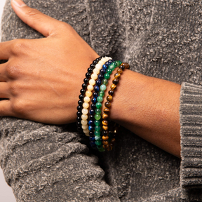 Model wears Stainless Steel Gemstone Beaded Bracelets