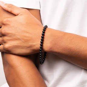 Model wears Stainless Steel Black Onyx Beaded Bracelet