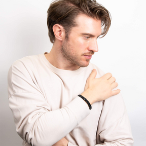 Model wears Black Stainless Steel Chain Plait Leather Bracelet