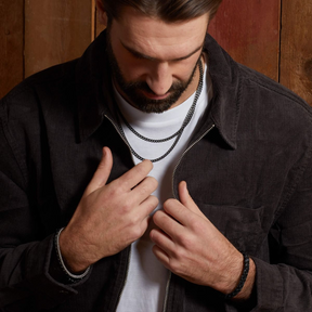 Model wears Black Stainless Steel Chain Plait Leather Bracelet
