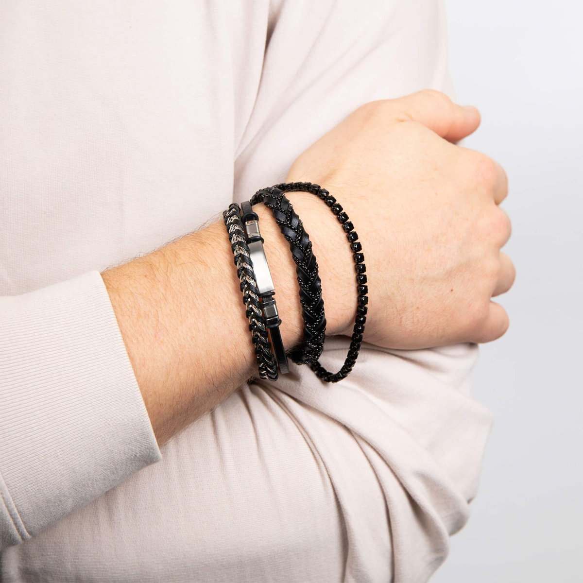 Model wears Black Stainless Steel Chain Plait Leather Bracelet & Black Leather & Stainless Steel ID Bar Bracelet