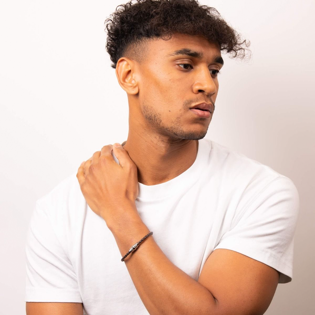 Model wears Skinny Stainless Steel Brown Leather Bracelet with Magnetic Clasp