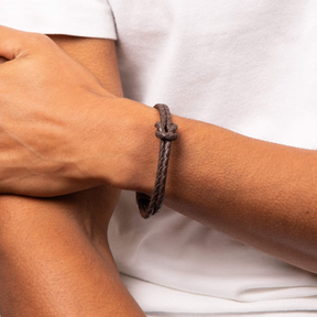 Model wears Double Row Knot Brown Leather Bracelet