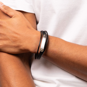 Model wears Woven Black Leather & Stainless Steel Multi Strand ID Bar Bracelet