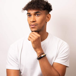 Model wears Woven Black Leather & Stainless Steel Multi Strand ID Bar Bracelet